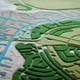 Illustration for article titled Rugs That Look Like the Earth As Seen From Your Window Seat